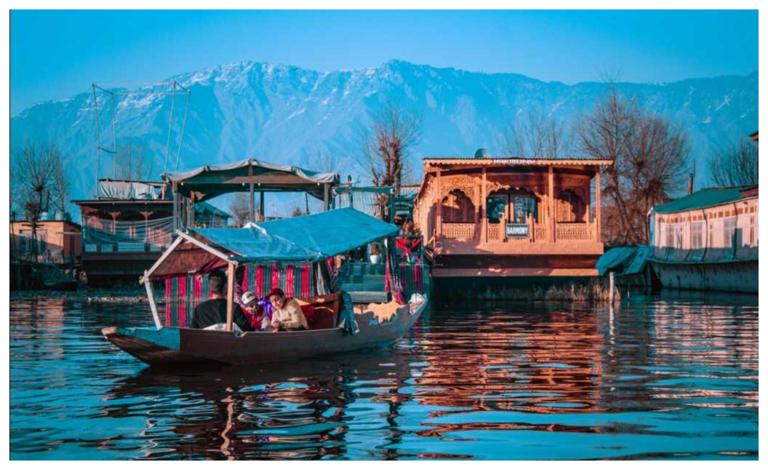 Jammu Kashmir: Tourists enjoying Shikara ride in Srinagar, kashmir tour package, places to visit in kashmir, places to visit in srinagar, best time to visit kashmir,places to visit in kashmir for honeymoon