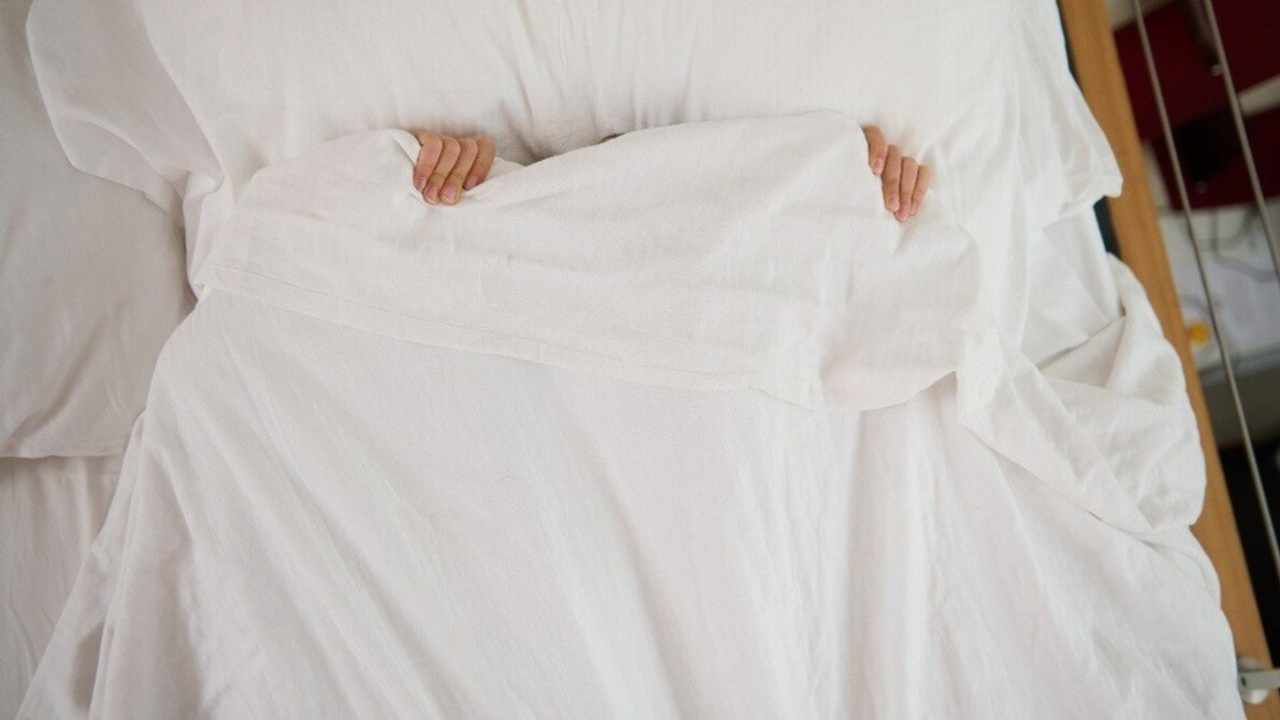 Health News: The truth about sleeping with your face covered under a blanket! Comfort or a health hazard?