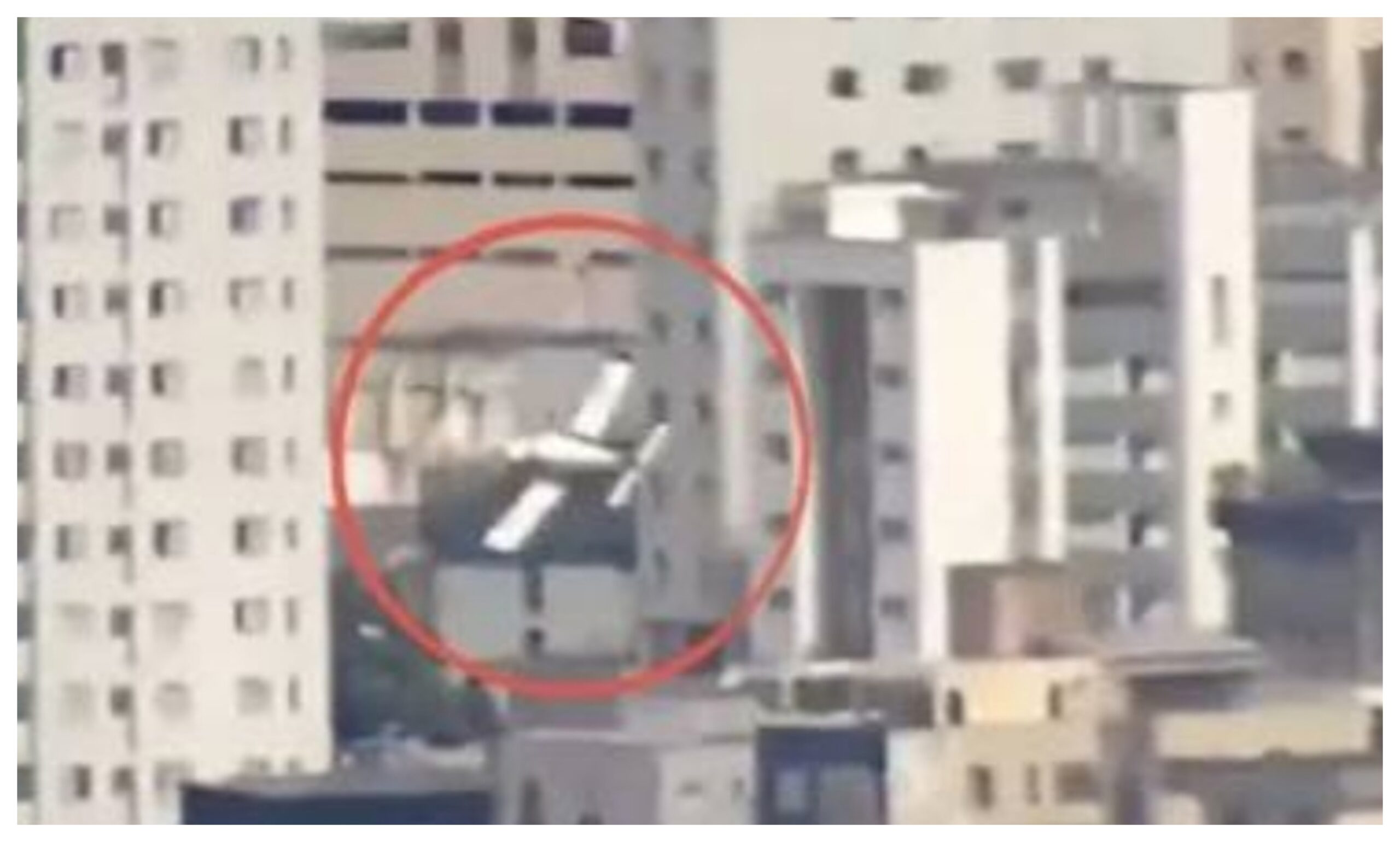 Two people died when a light aircraft collided with a building in Brazil.
